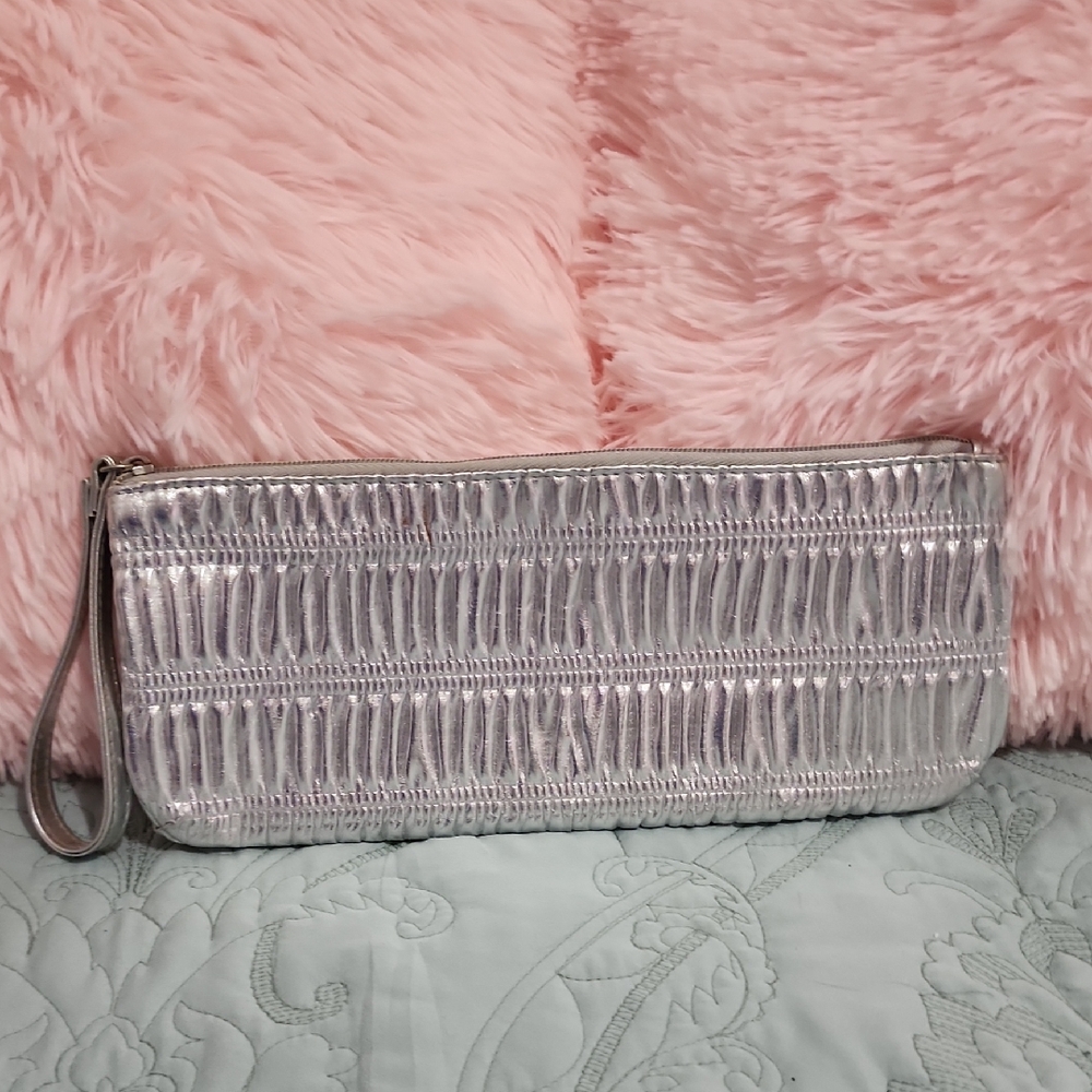 CLINIQUE Sleek Silver Wristlet Clutch with Elegant Design